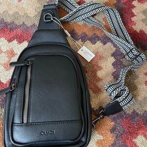 Chic Black Crossbody Bag with Patterned Strap